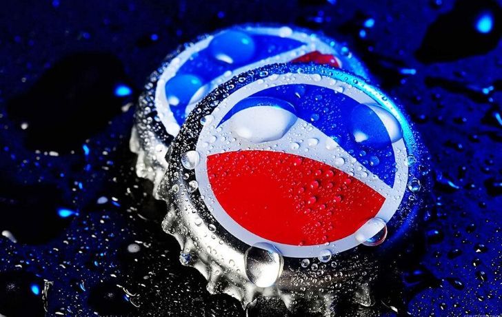 Two Pepsi bottle tops