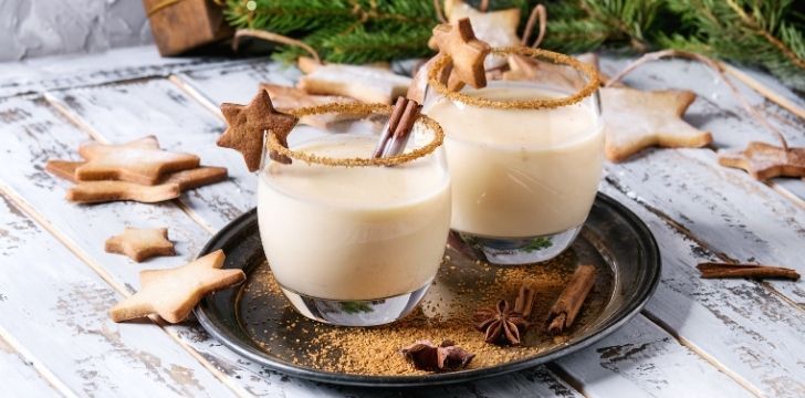 Two festive glasses of eggnog