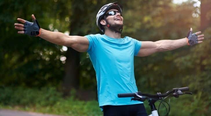 A man enjoying his bicycle ride