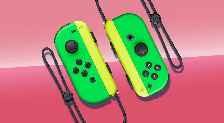Two green and yellow Switch controllers