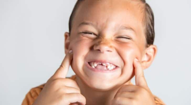 A boy with missing teeth