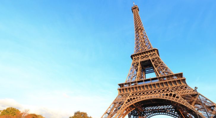 The Eiffel tower standing tall in the summer heat