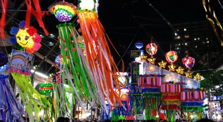 A collection of colorful lanterns hung up in a street for the Japanese Tanabata festival