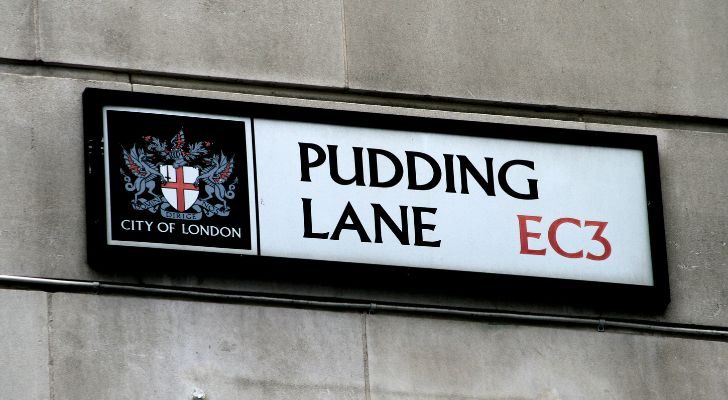 A City of London sign reading "Pudding Lane EC3"