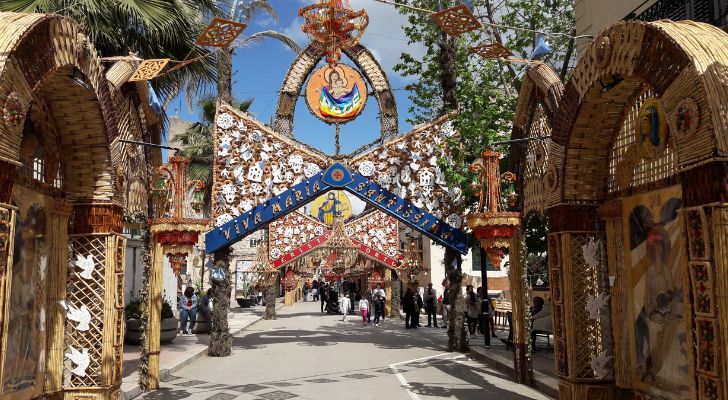 Archways made out of bread for the festival line the streets of San Biagio Platani, Italy