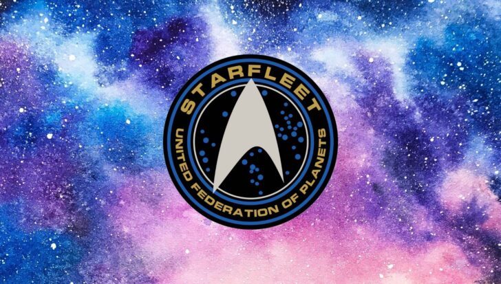 Starfleet emblem against a colorful galaxy background