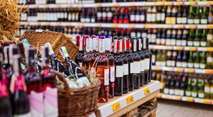 A selection of wines in the alcohol section of a supermarket