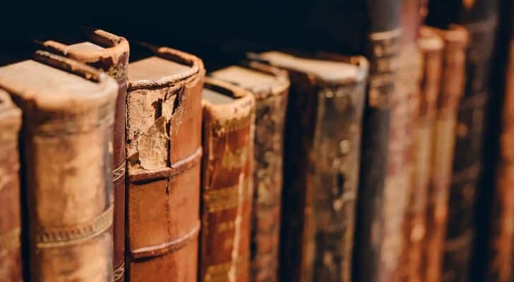 A collection of old books, weathered by time