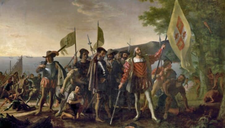 Historical depiction of European explorers landing on a shore with swords and flags with indigenous people in the background