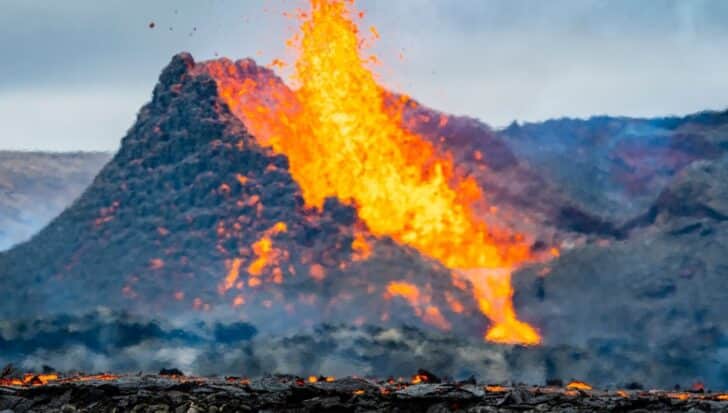 Lava erupting from an active volcano with fiery orange and red colors