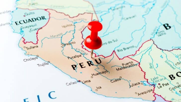 Map highlighting Peru pinned with a red pushpin, showing neighboring countries Ecuador and Bolivia