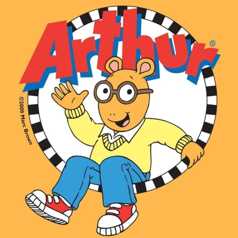 Arthur, the cartoon aardvark, waves while sitting in a black and white circle with the show's title above him