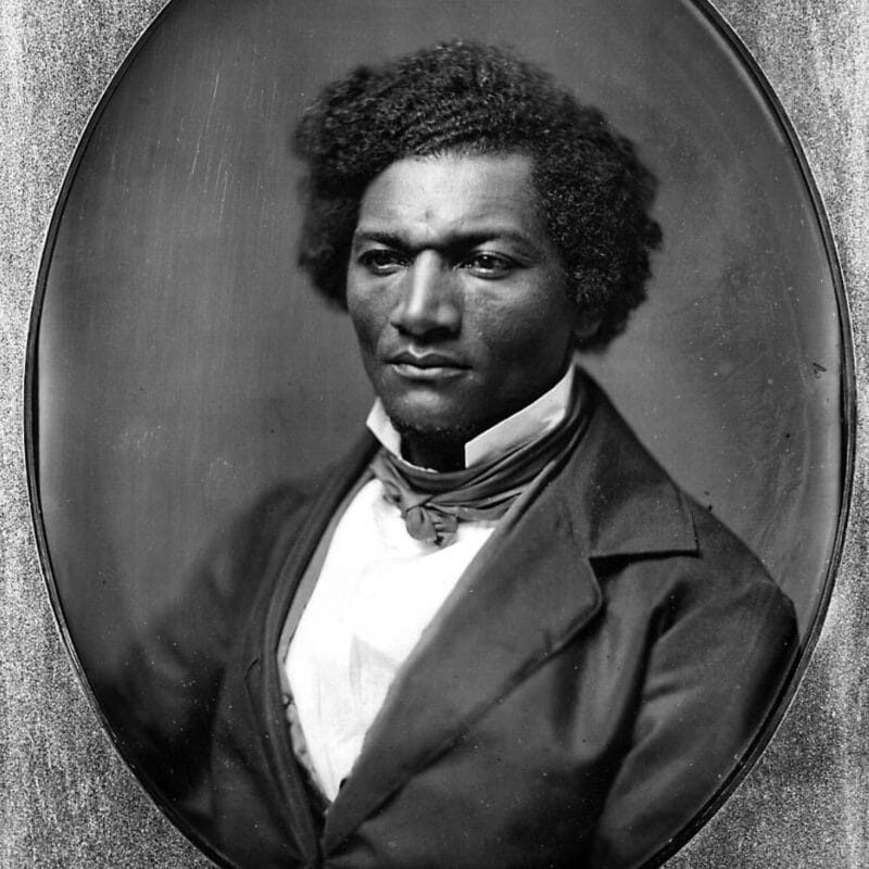 Frederick Douglass, dressed in formal 19th-century attire
