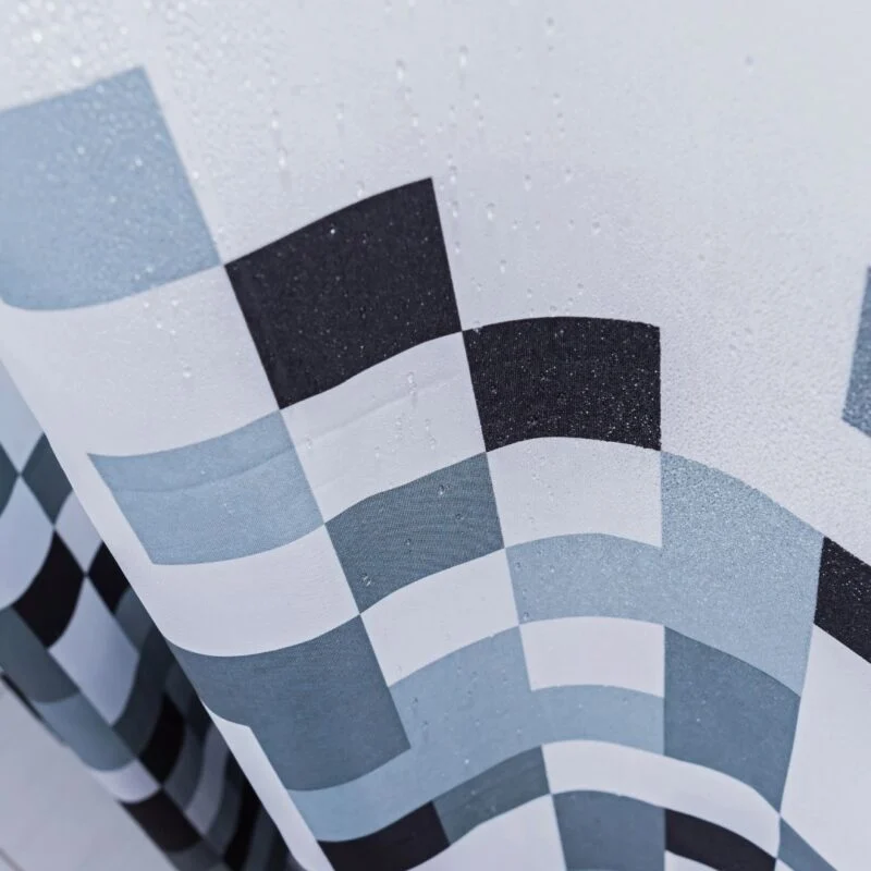 Shower curtain with alternating black and white checkered pattern