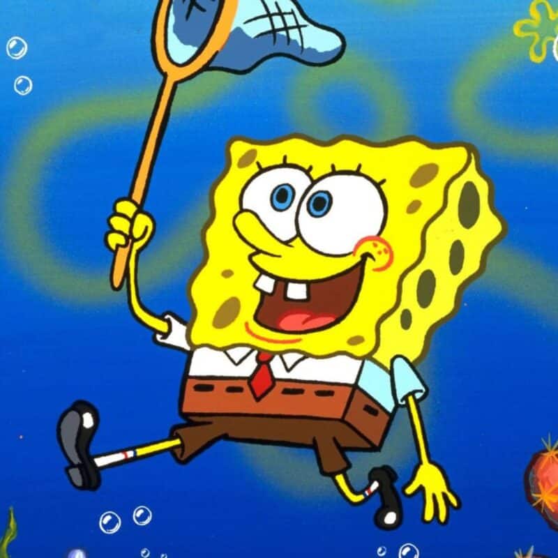 SpongeBob SquarePants, wearing his usual attire of a white shirt, red tie, and brown square pants