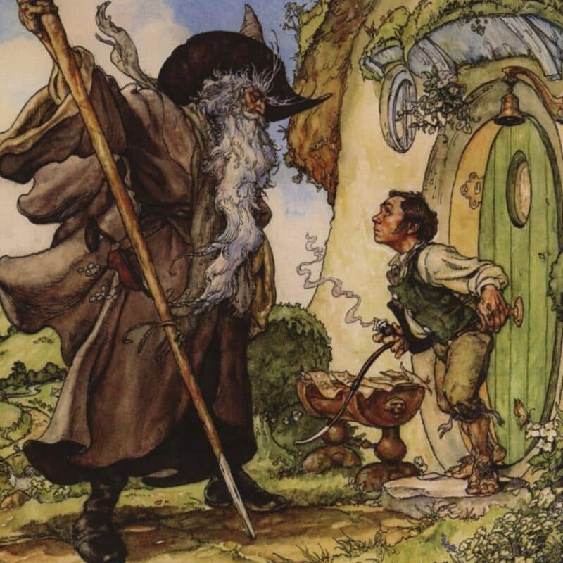 Gandalf, with a long white beard and a pointed ha,t standing outside a round, green door, speaking to a hobbit
