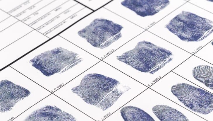 Fingerprint records on a sheet, related to a mistaken identity scandal involving the CIA