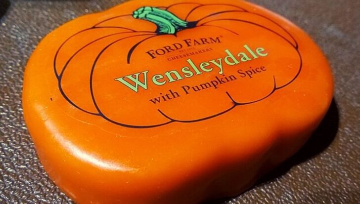 A package of Ford Farm Wensleydale cheese with pumpkin spice, shaped like a pumpkin